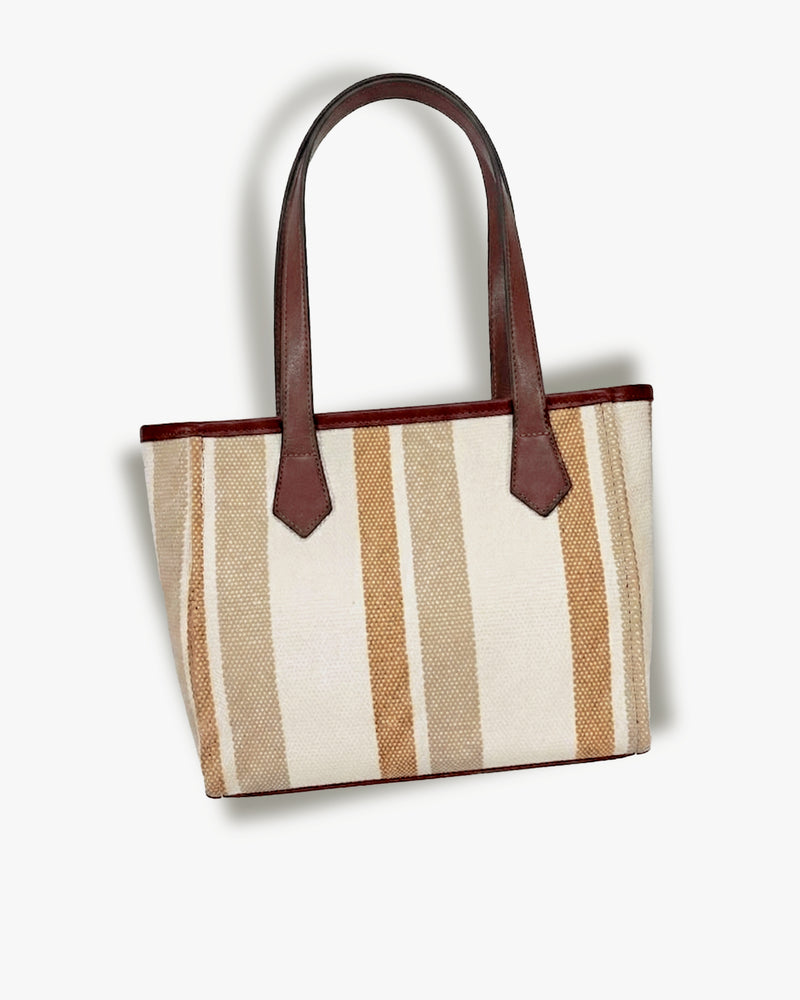 Affogato handbag in a neutral tone, styled as a modern work handbag
