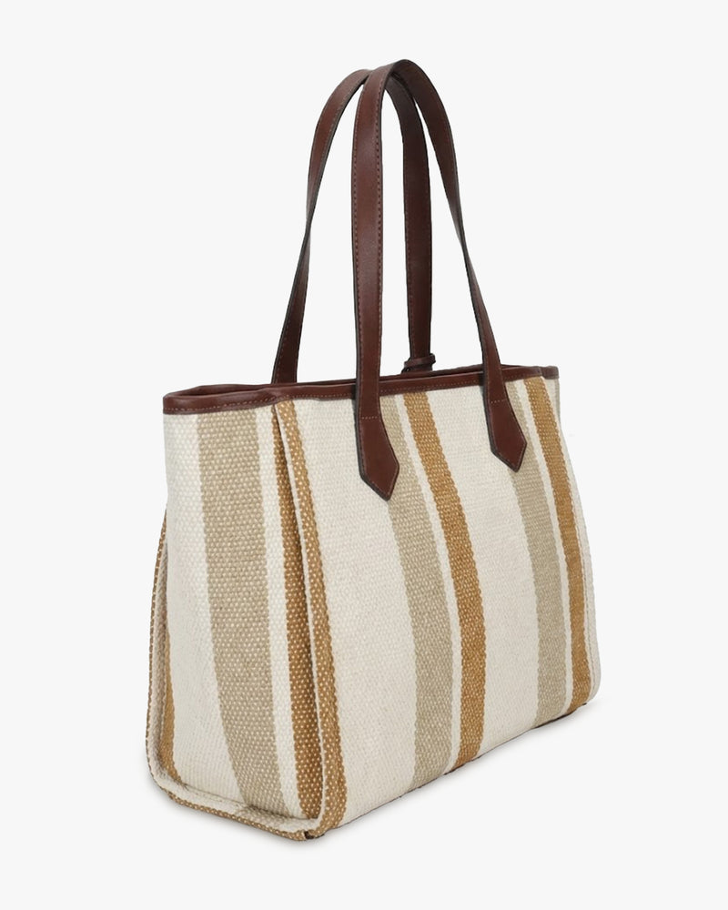 Affogato handbag in a neutral tone, styled as a modern work handbag
