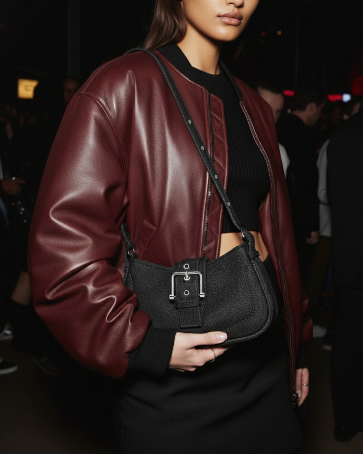 TOki PM denim shoulder bag worn casually for everyday use
