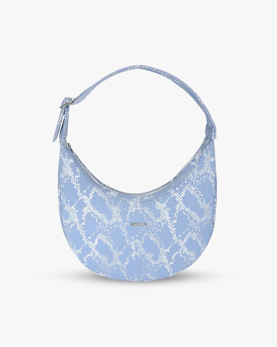 Siren moon bag with curved design worn as a shoulder bag