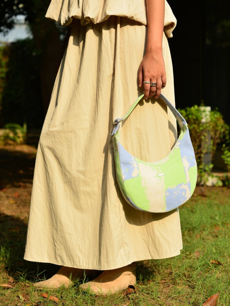 Terra moon bag styled as a relaxed everyday shoulder bag
